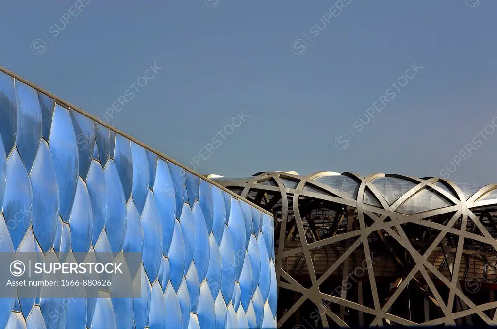 At left Olympic National Swimming Centre  At right National Olympic Stadium, by Herzog and Meuron,Beijing, China