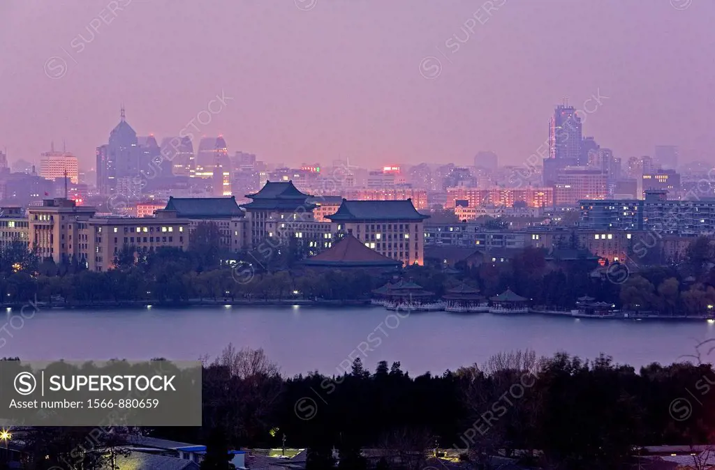 Lake of Beihai Park and west Beijing, as seen from Jingshan Park, Beijing, China