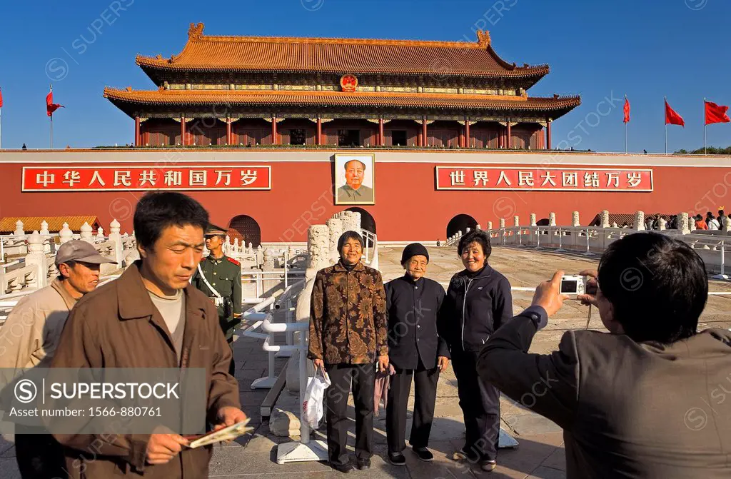 Tourists in Gate of Heavenly Peace with Portrait of Mao Ze Dong ,in Tiananmen Square,Beijing, China