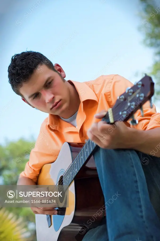 Male musiscian - Man playing guitar