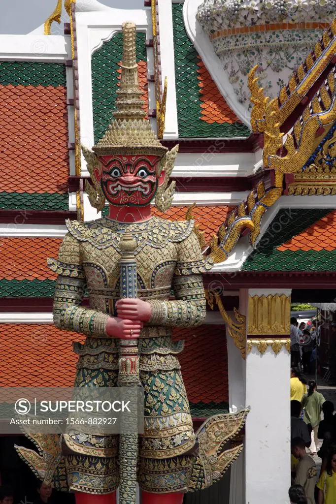 The mythological giant guarding an entrance to Wat Phra Kaeo, Bangkok, Thailand