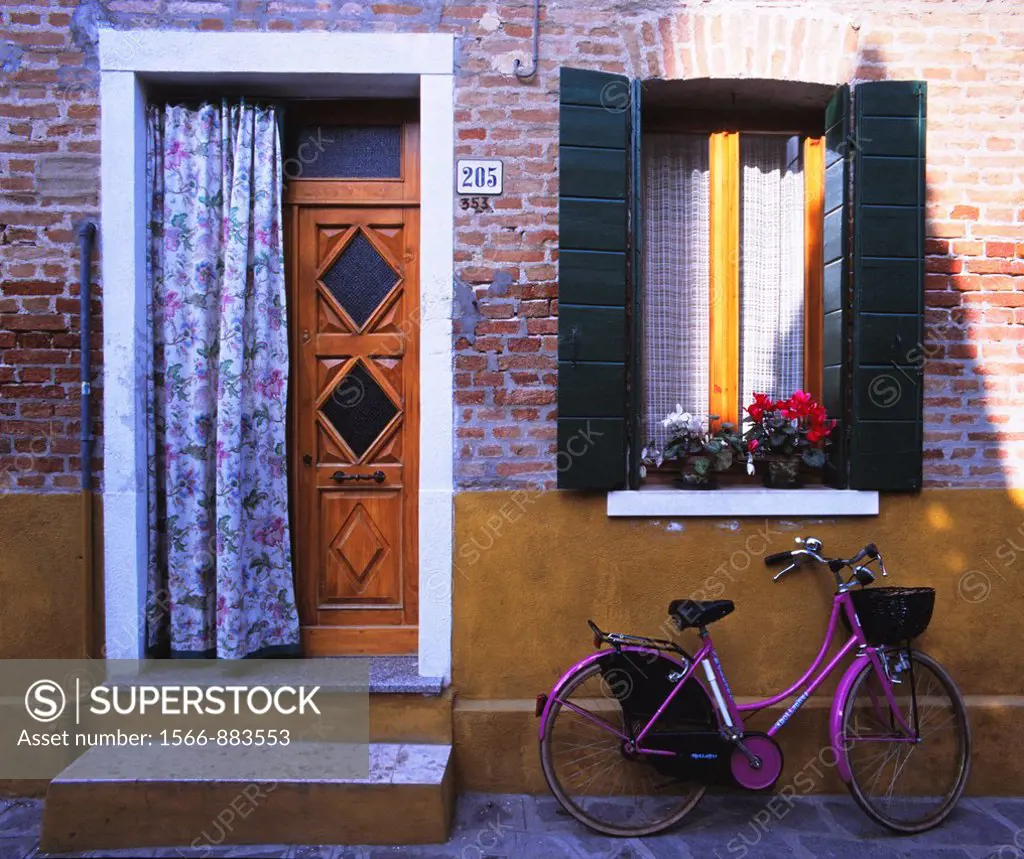Colourful House with bicycle, Burano Island, Venice, Italy