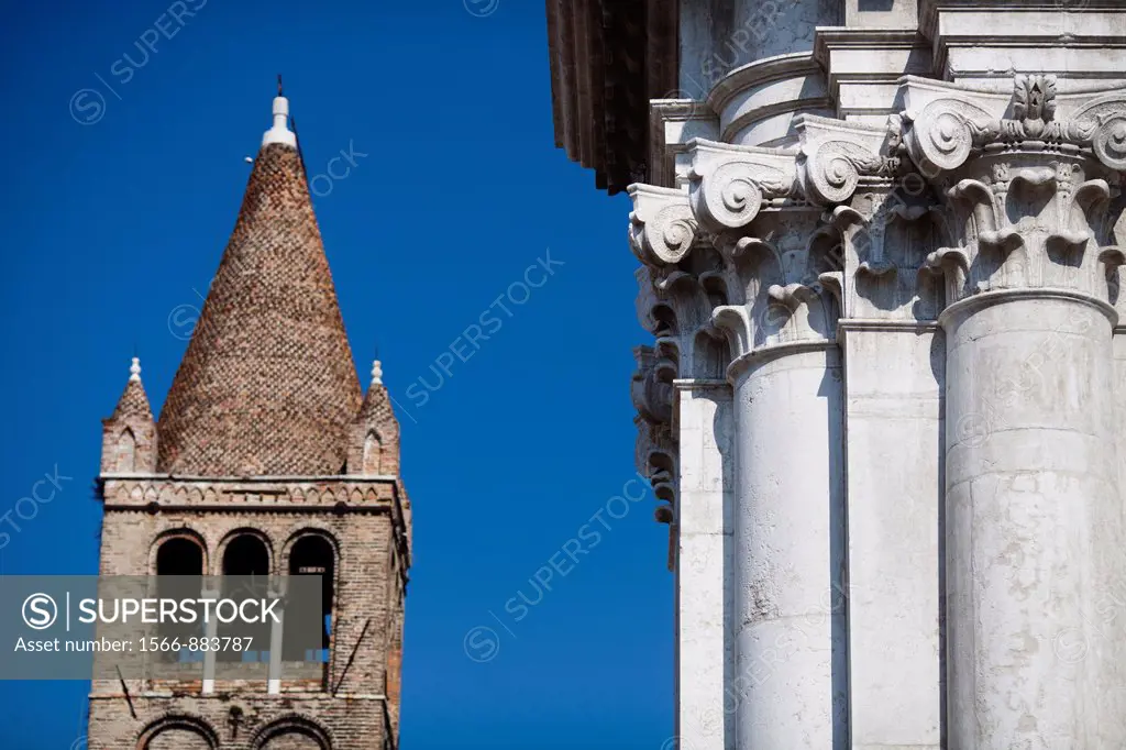 Campanile bell tower and detail of the facade, San Barnaba church, Venice, Italy