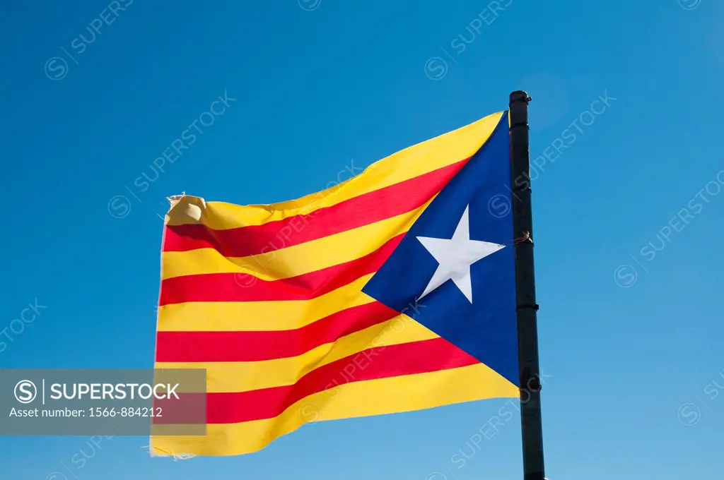 Separatist Catalan flag waving under the wind, Lleida, Spain