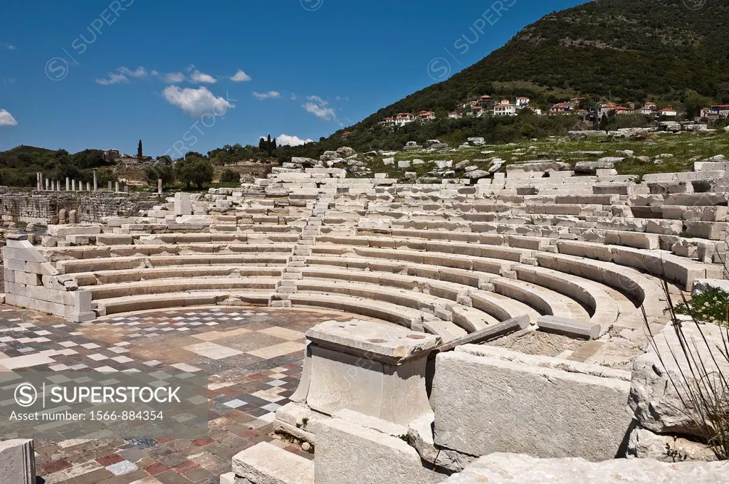 The theatre at Ancient Messene Ithomi with the modern village of Mavromati in the background, Messinia, Southern Peloponnese, Greece