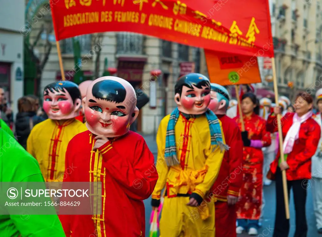 Paris, France, Chinese in Traditional Dress, Parading in Chinese new year Carnival in Street in the Marais Area