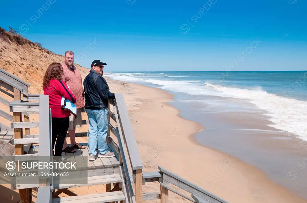 People watching the ocean at stairs of Marconi Beach, Cape Cod