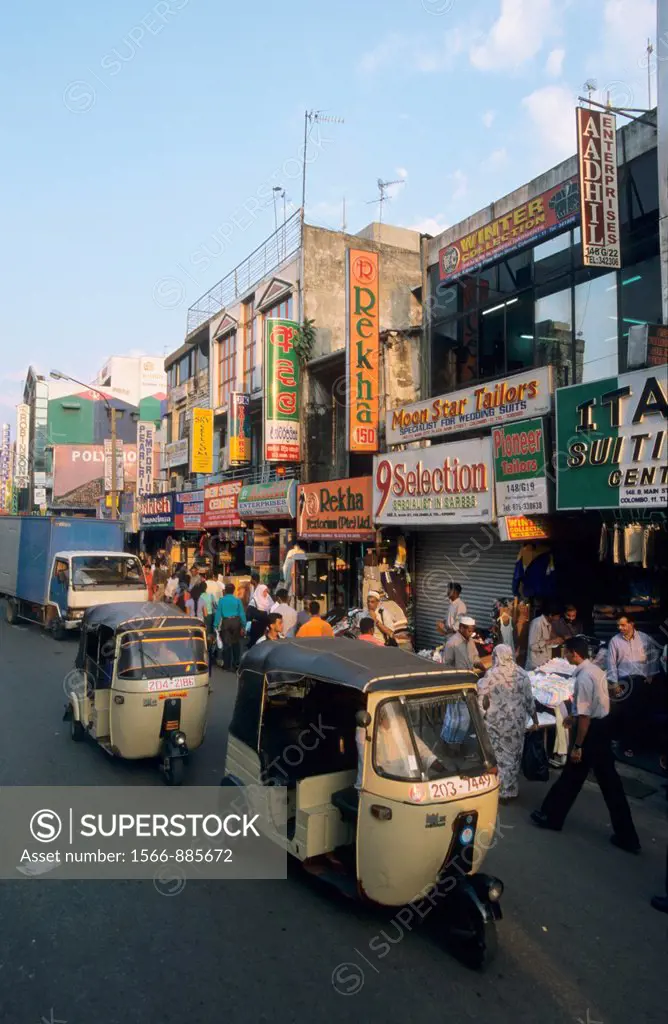Crowded street with typical tuktuks, 148 Main Street, Colombo 11 (Pettah), Sri Lanka