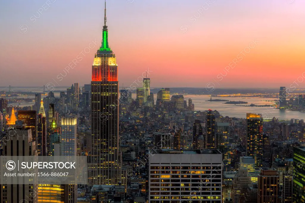 View looking south at twilight from the Top of the Rock including the Empire State Building, illuminated in Red/White/Green in honor of Columbus Day, ...