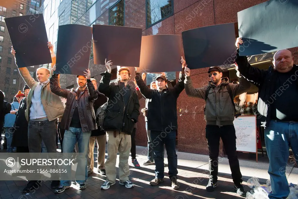 Protesters hold up blank cardboard representing blacked out computer screens Several hundred members and supporters of the NY Tech Meetup group protes...