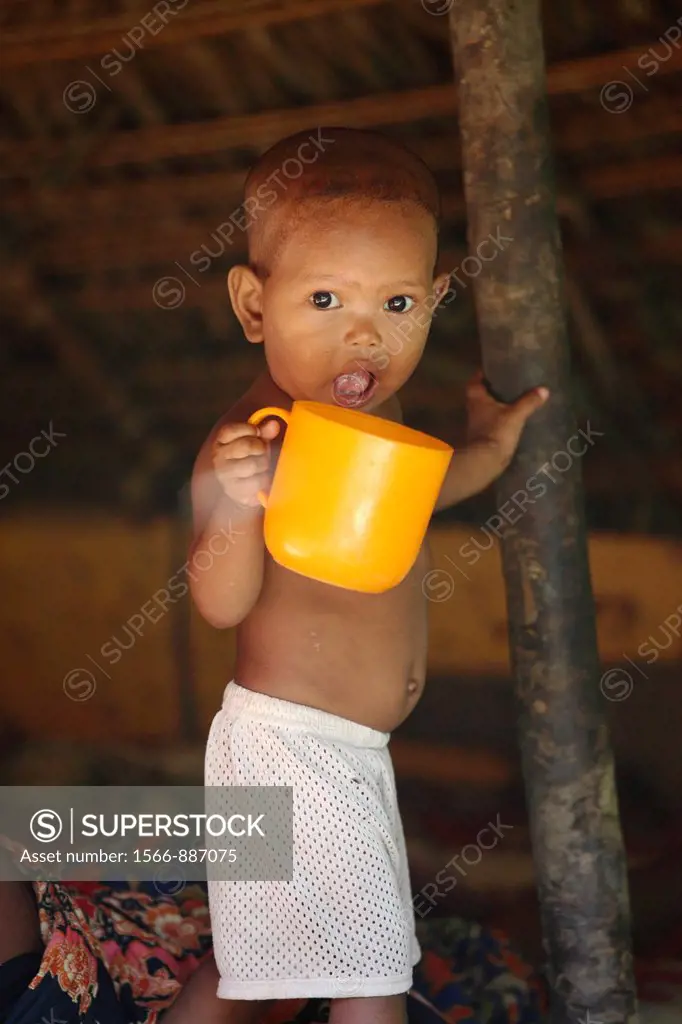 Aborigine child in a village, Taman Negara rainforest, Malaysia