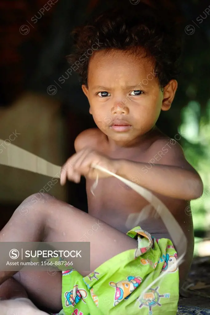 Aborigine child in a village, Taman Negara rainforest, Malaysia