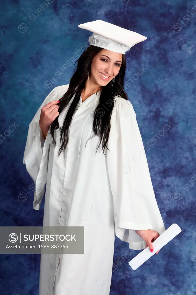 Young posing for graduation pictures