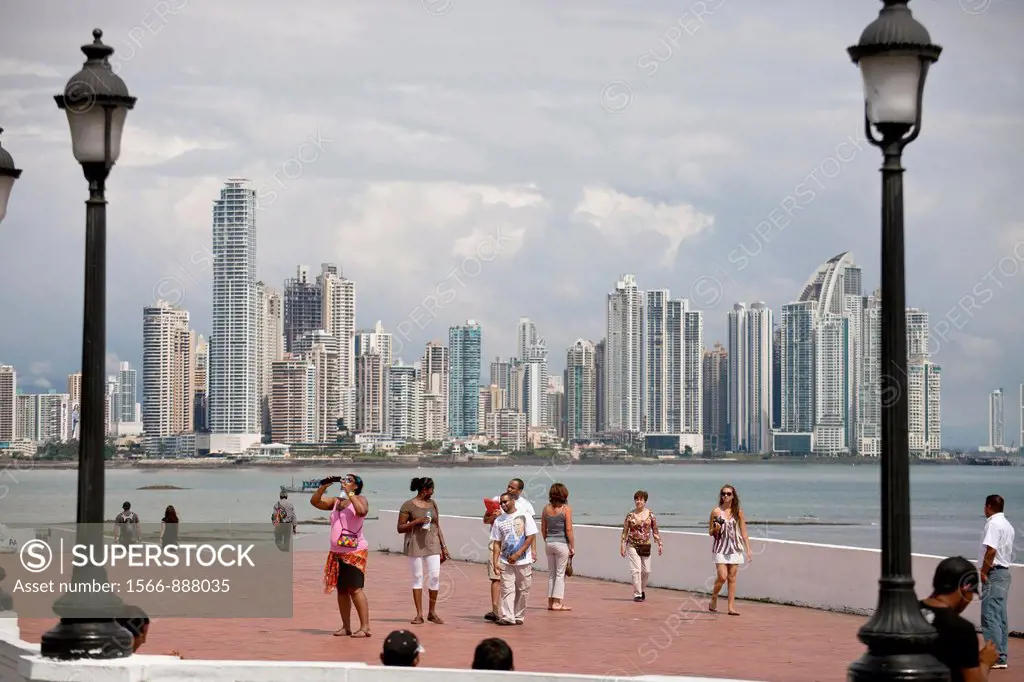 Lanterns along the promenade, Paseo Esteban Huertas, in front of the skyline of Panama City, Panama, Central America