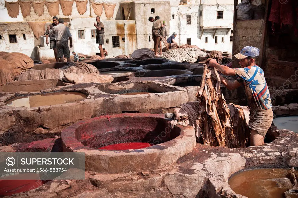 People at work in the Chouwara Leather Tannery of Fez, Morocco