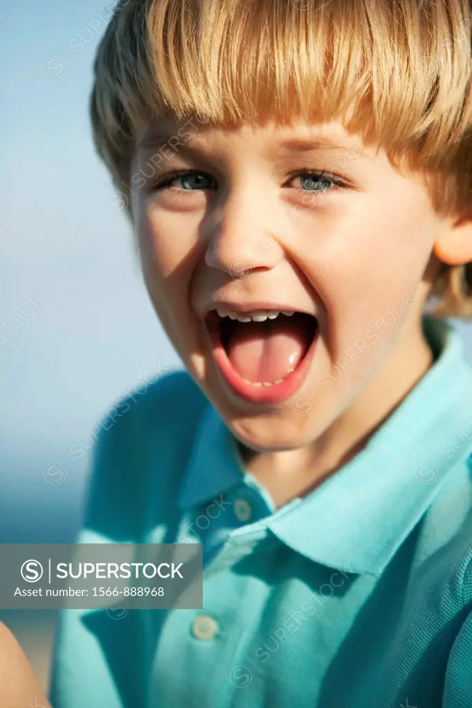 Portrait of Blond Boy Laughing - Pompano Beach, Florida USA