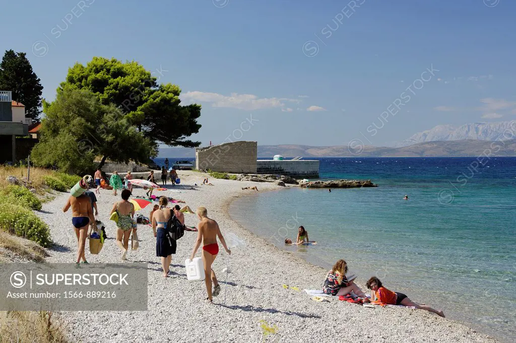 Tourists on a beach in Duba Peljeska village, Croatia