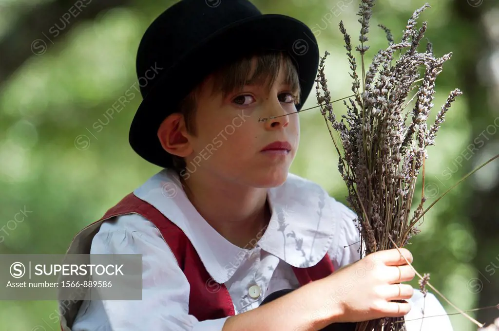 Europe, France, Vaucluse, 84, Sault, Provence boy in costume during the festival of lavender