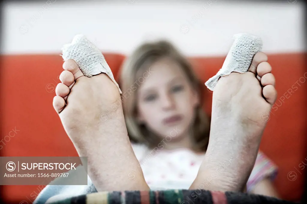 Teen girl in rehabilitation after an operation on the toes.