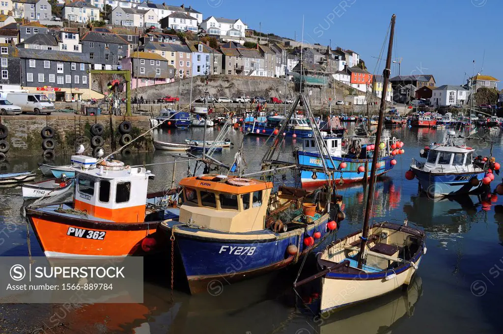 fishing boats in the harbour at mevagissey in cornwall, england, uk