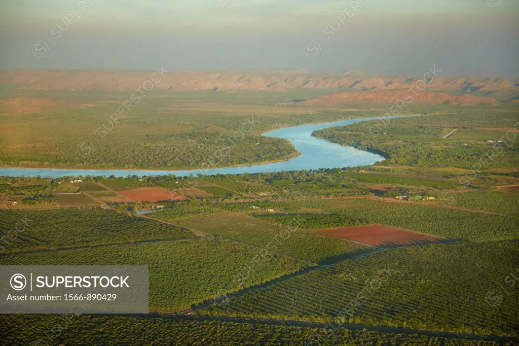 Aerial view of orchards, crops and Ord River, Kununurra, Kimberley Region, Western Australia, Australia