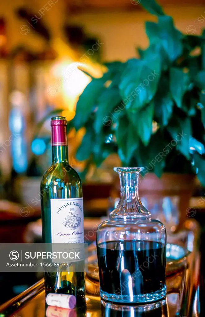 Paris, France , Dteail Bottle of Natural Red French WIne on top of Bar in a Old Bistro Restaurant,