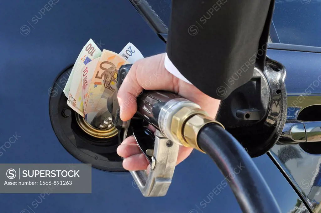 Banknotes stuffed into the Fuel Tank of a Car