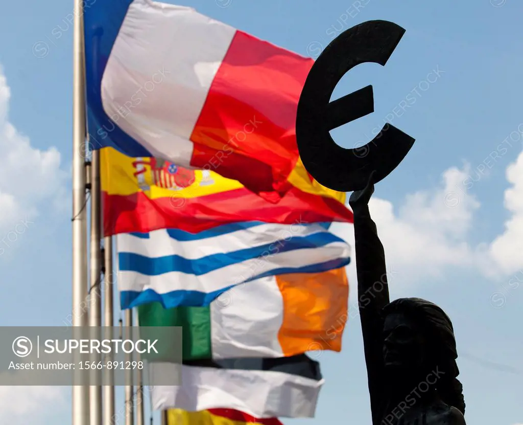 European flags and Euro symbol at the European Parliament headquarters in Brussels, Belgium