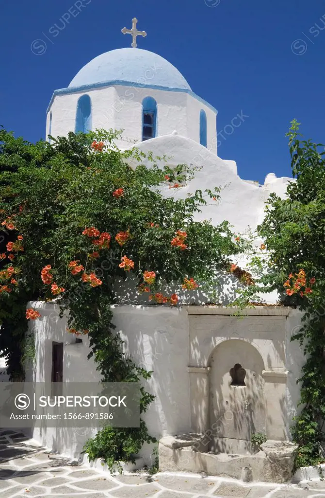 Blue domed whitewashed Greek Orthodox church of Agia Triada in Parikia, Paros, Cyclades, Greece
