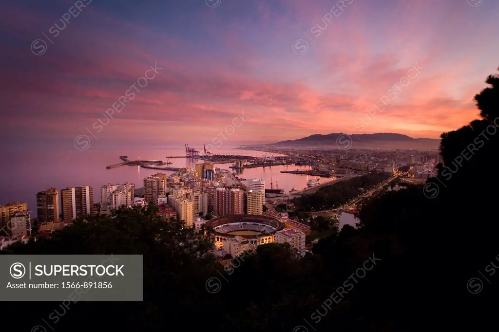 Views of Malaga, in the evening from Mount Gibralfaro Malagueta, with view of the harbor, the bay and part of the city  Malaga, Andalusia, Spain