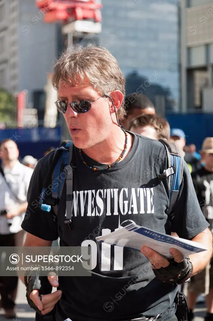 A protester wearing an ´Investigate 911´ shirt hands out literature at the World Trade Center PATH station in New York City, New York, USA
