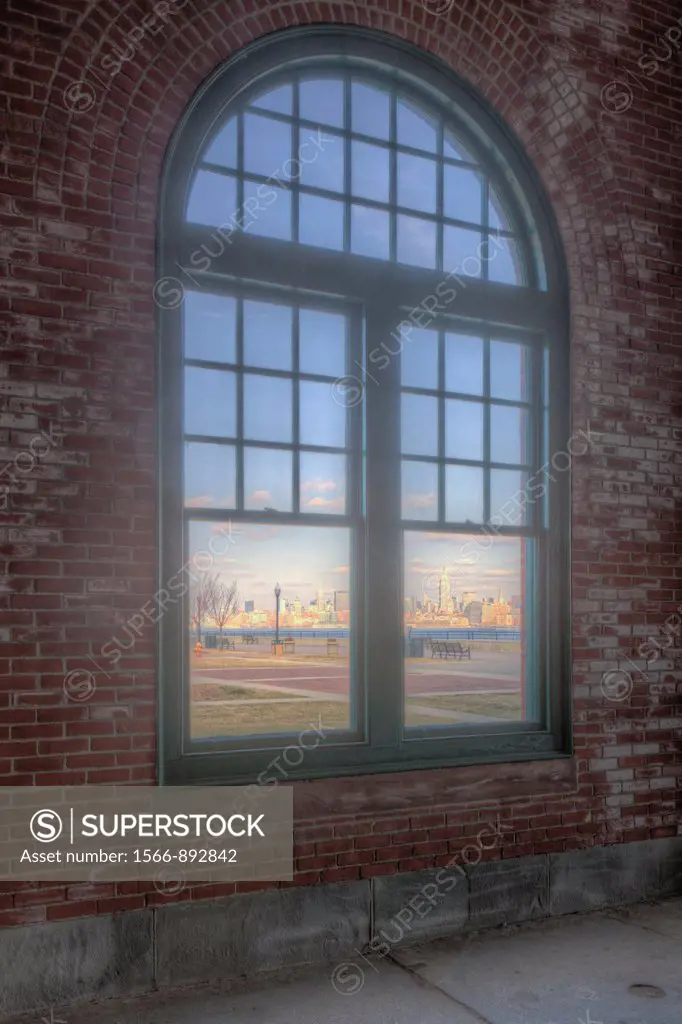 The skyline of Manhattan in New York City across the Hudson River as viewed from inside the Central Railroad of New Jersey CRRNJ Terminal in Liberty S...