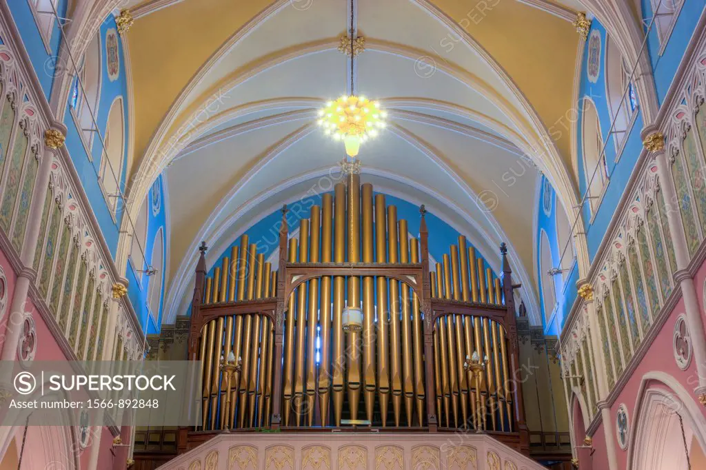 The organ pipes on the balcony in the rear of St  Bridget´s Church, one of the churches in the Parish of the Resurrection, in Jersey City, New Jersey