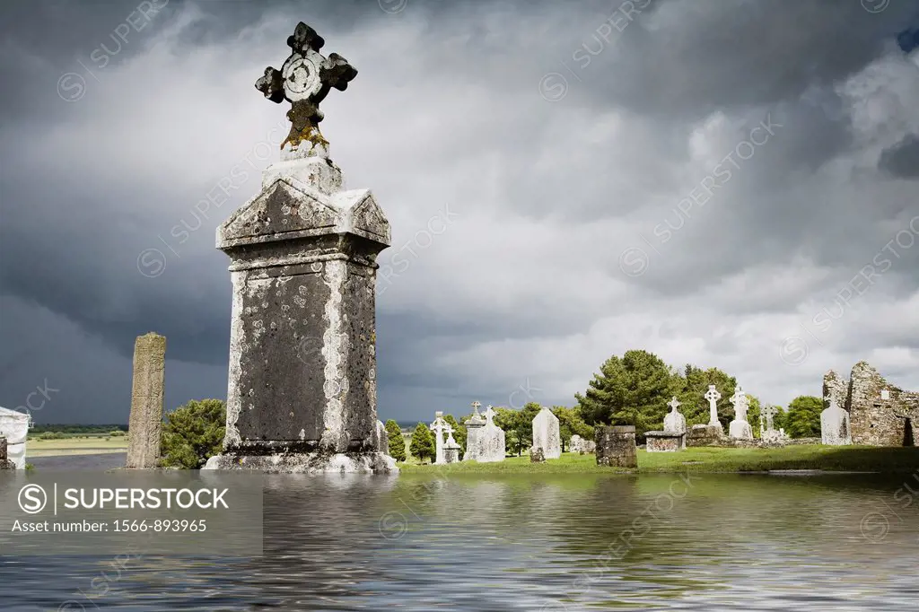 Flooded graveyard at Clonmacnoise, County Offaly, Ireland, Europe