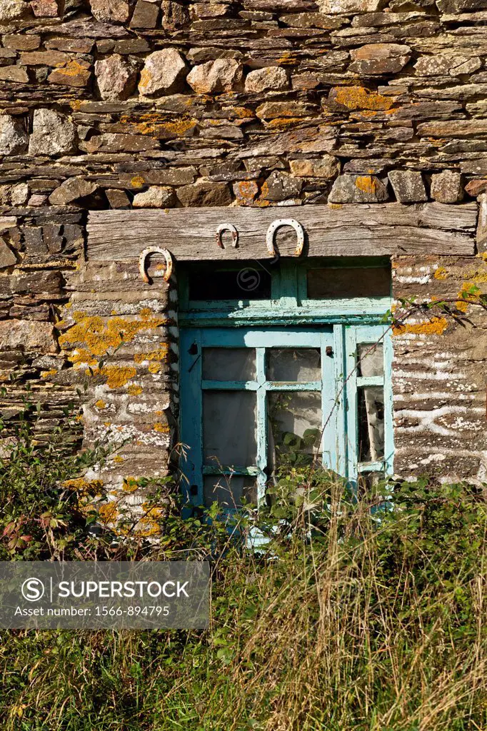 horseshoe of protection on the input of an old house between the hamlet and commune gourhel Augan. former home, broceliande, Morbihan, Brittany. Franc...