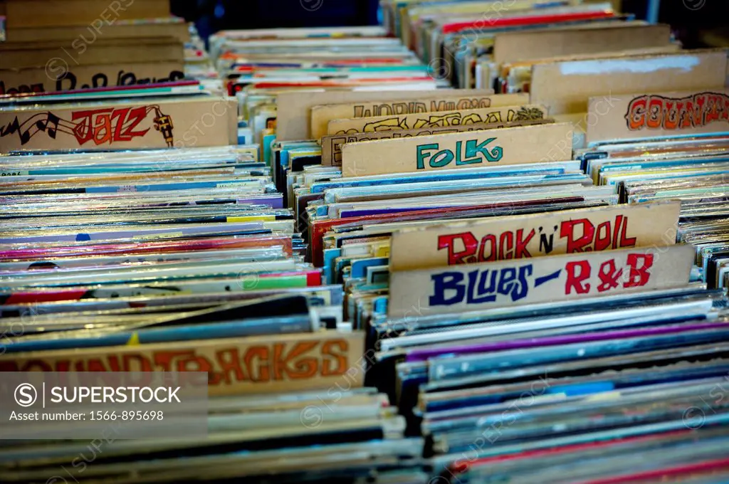 Records in street market sorted by style