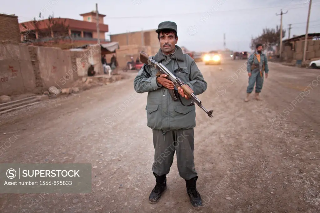 car-searching by Afghan Police in Kunduz