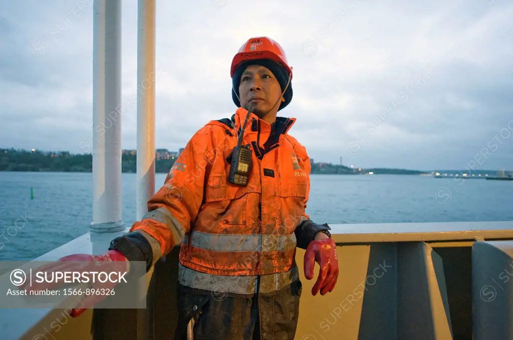 Stockholm, Sweden. An Indonesian seaman or sailor on the container-vessel MV Flintercape, during a journey from Rotterdam, Netherlands, to Sundsvall, ...