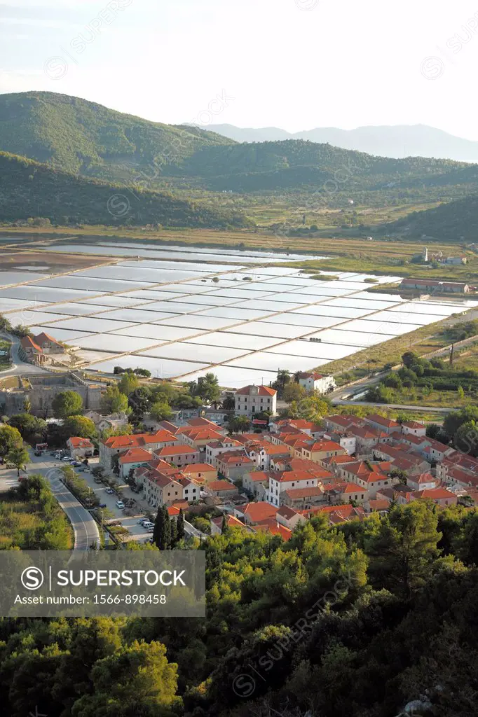 Town of Ston known for salt production, salt pans in the background, Peljesac peninsula, Croatia