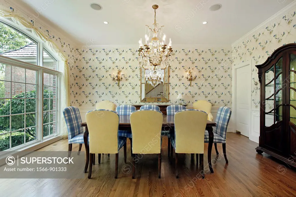 Dining room with yellow and blue plaid chairs