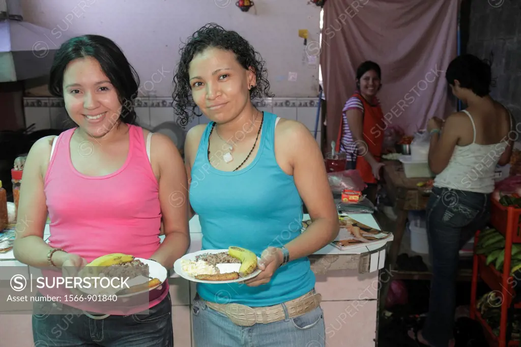Nicaragua, Managua, neighborhood cafeteria, restaurant, family business, dining, typical food, plate, rice and beans, banana, farmers cheese, eggs, Hi...