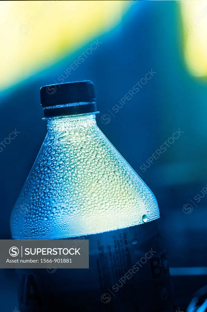 Top of a bottle to the light, bottled mineral water.