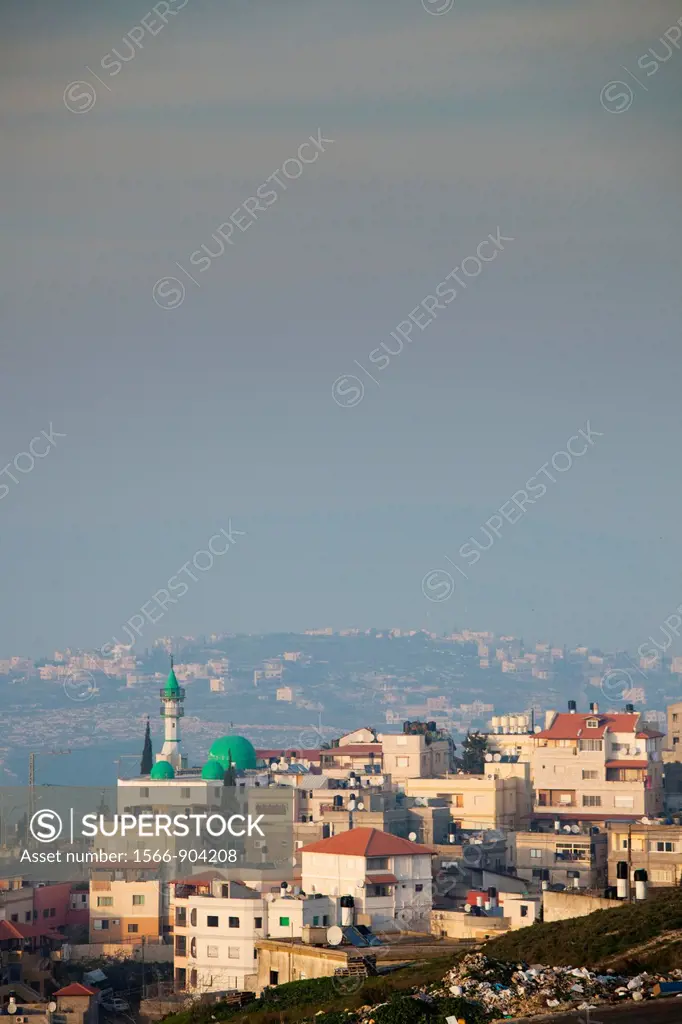 Israel, The Galilee, Nazareth, elevated city view, dusk