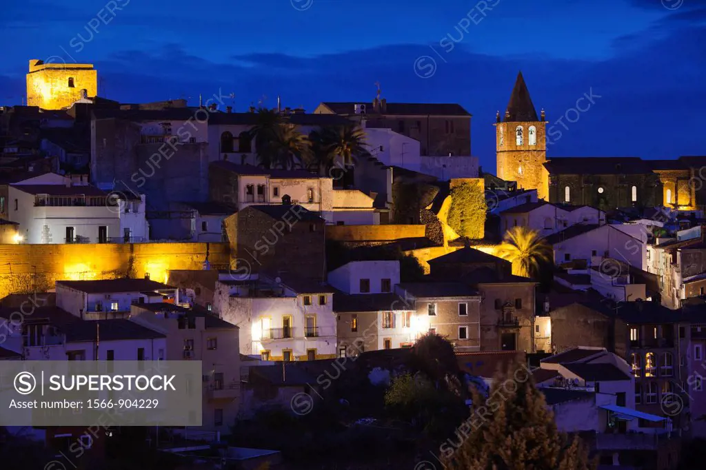 Spain, Extremadura Region, Caceres Province, Caceres, Ciudad Monumental, Old Town,elevated town view with the Eglesia de Santiago church, dusk