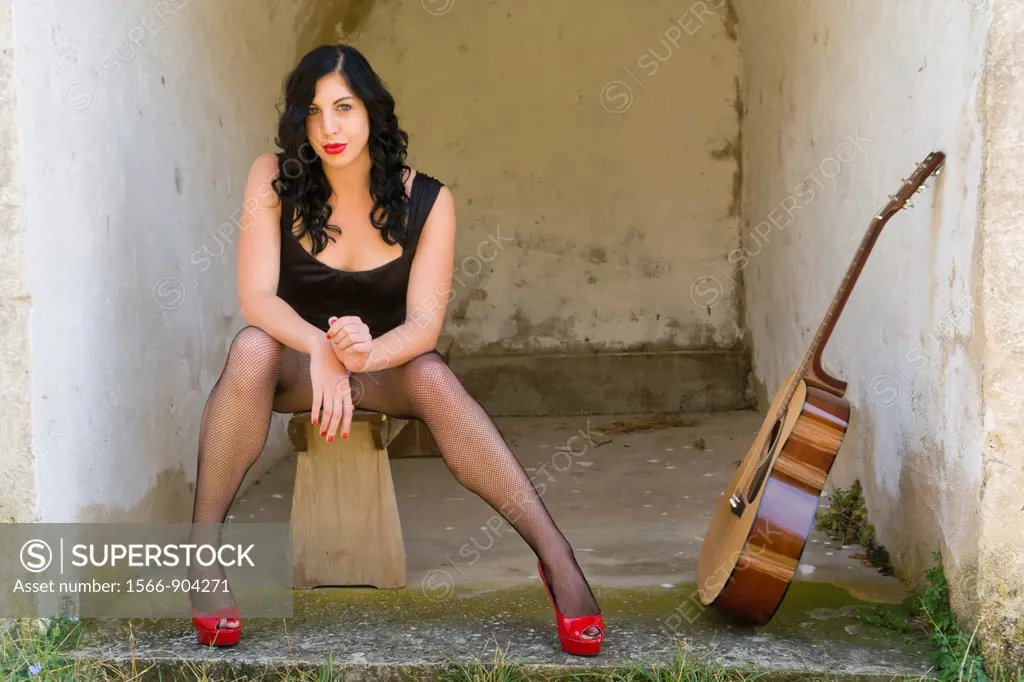 Pretty woman and a guitar