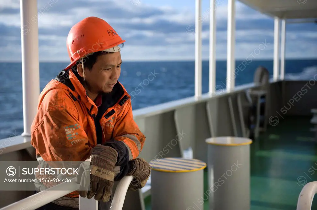 Portrait of an Indonesian seaman or sailor on the container-vessel MV Flintercape, during a journey from Rotterdam, Netherlands, to Sundsvall, Sweden....