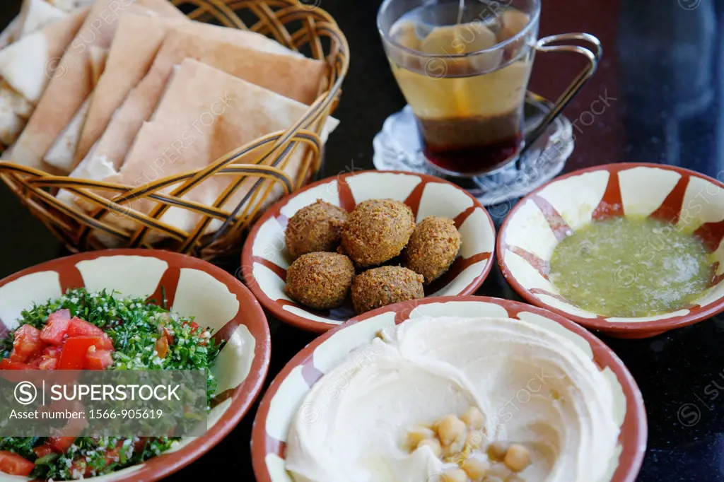 Typical breakfast of hummus, falafel salad and pita bread, Aqaba, Jordan