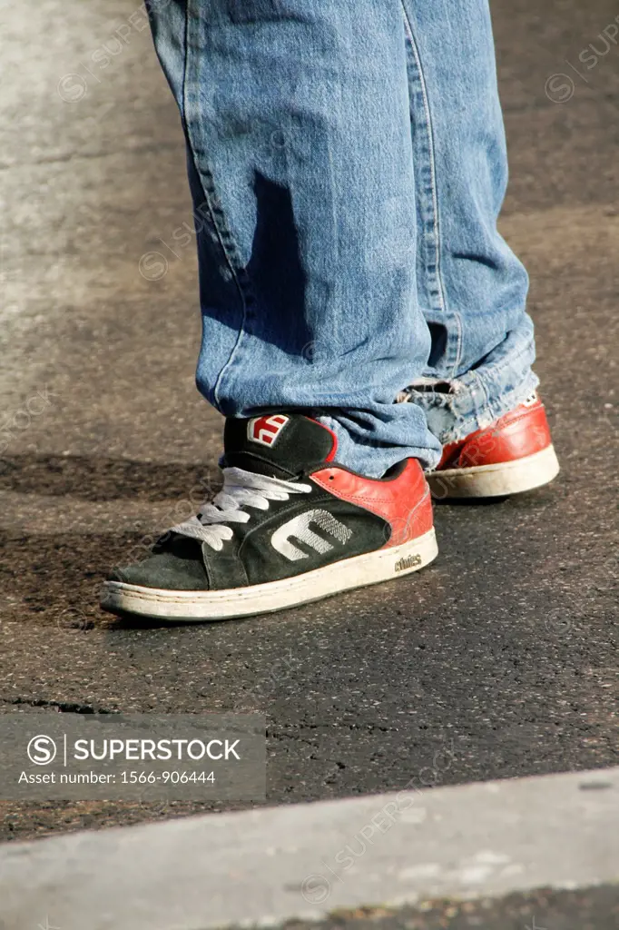 teenager shoes standing in street
