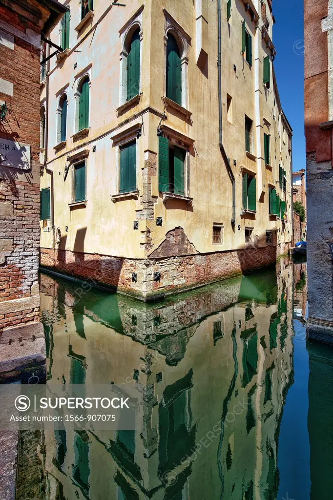 Building reflected on a canal, San Polo, Venice, Italy