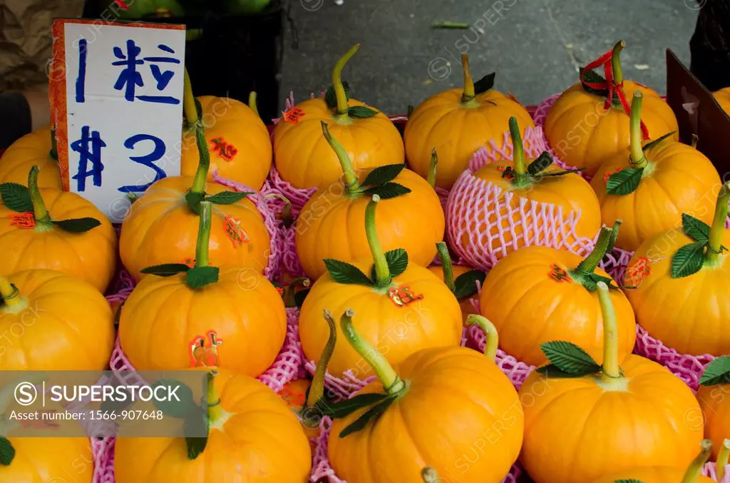 Popular small golden pumpkins for sale during Chinese New Year